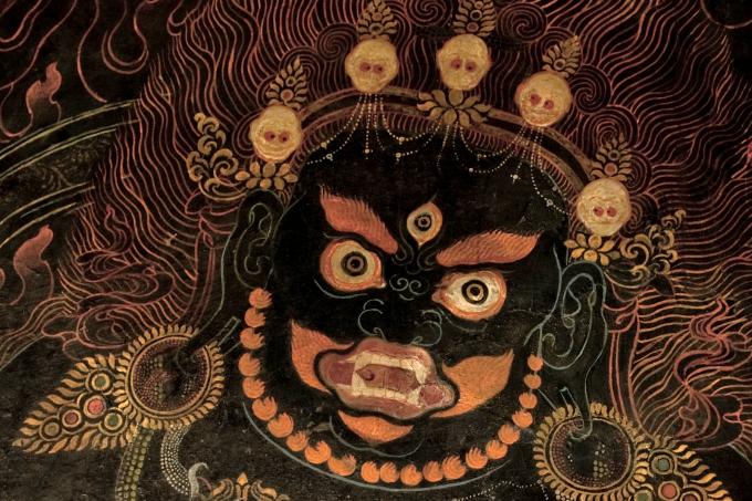 Working by electric lights supplied by a gas generator, the restorers were able to complete their work on the gönkhang's murals in just over two months. the restored image of Gur Gönpo in Galingteng